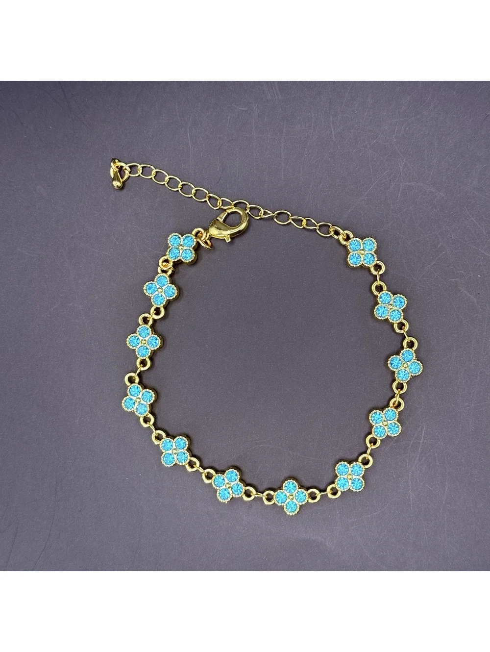 candy+clover aqua crystal clover gold tone bracelet